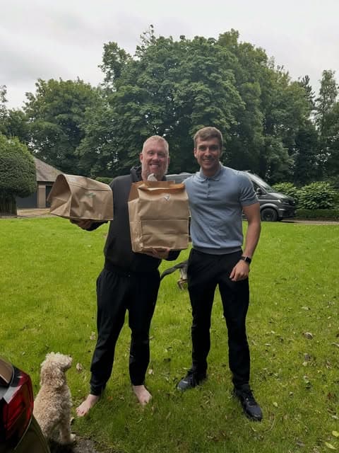 Jake and a friend holding TruePlate delivery bags